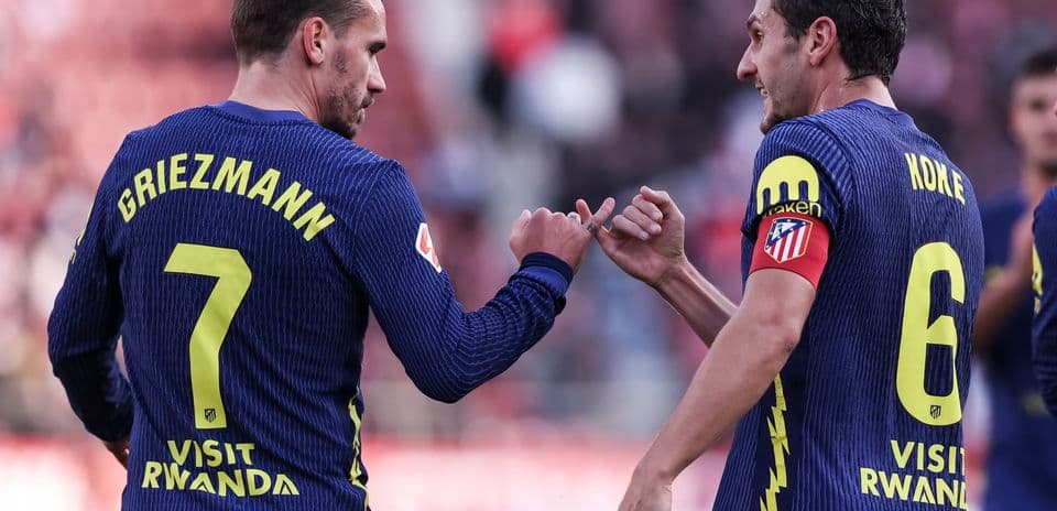 Griezmann y Koke celebrando durante el partido