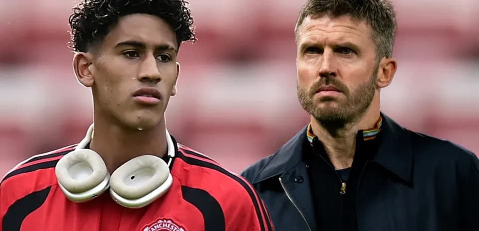Jugador de Manchester United junto al entrenador