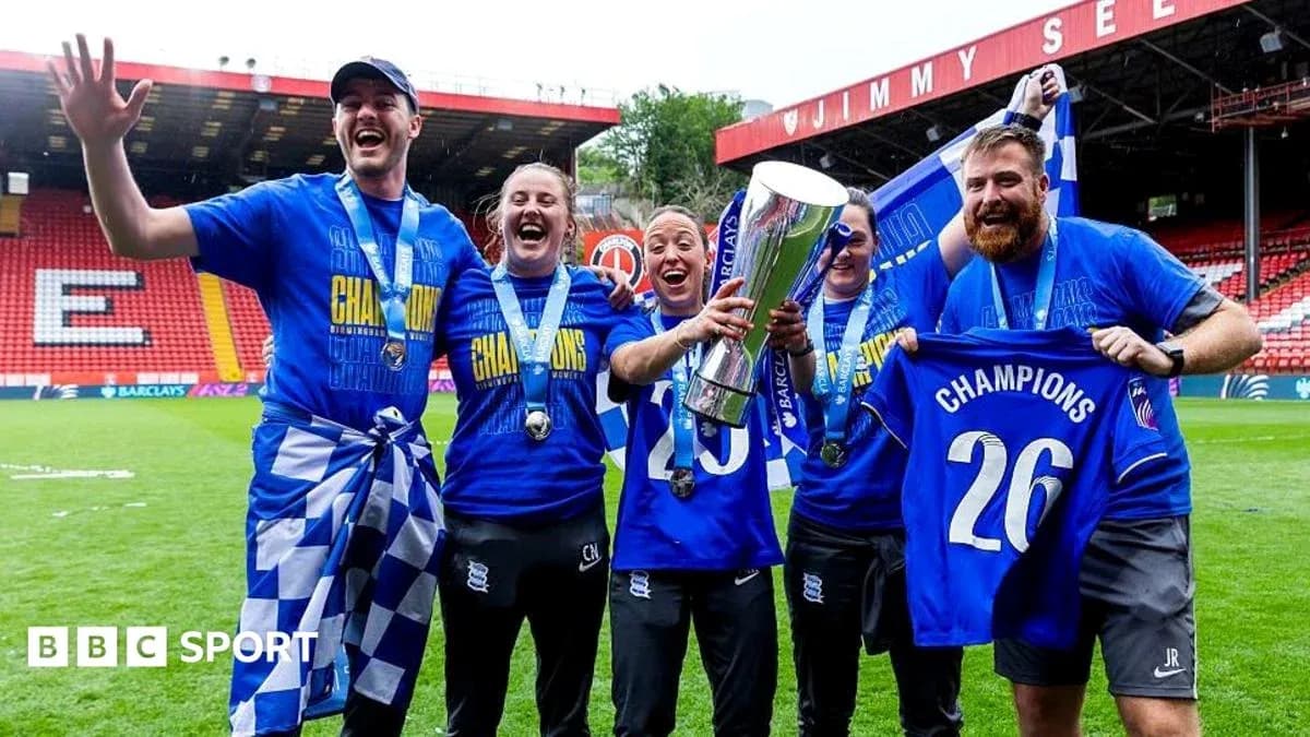 Celebration of Birmingham City champions with trophy