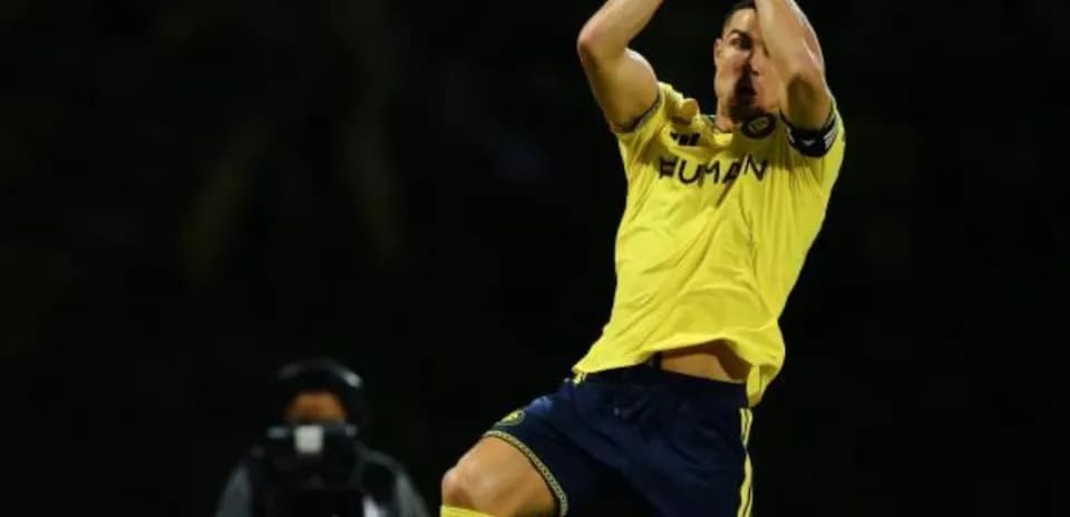 Jugador celebrando tras anotar un gol en partido