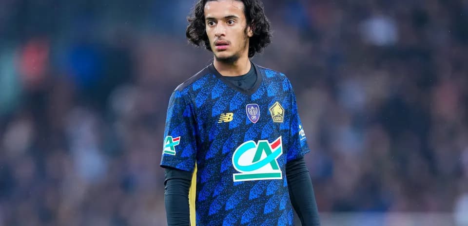 Jugador de Lille OSC en acción durante el partido