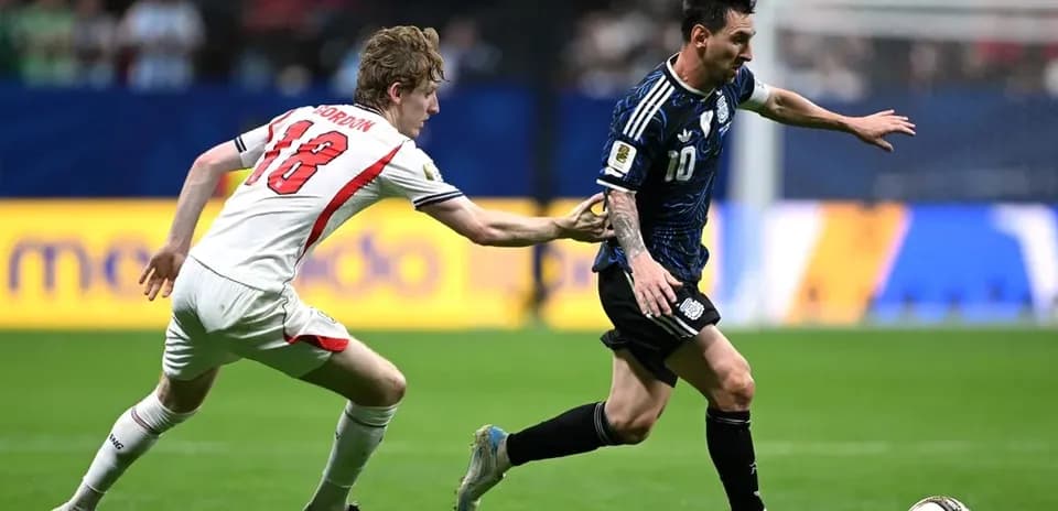 Lionel Messi dribbling past defender during match