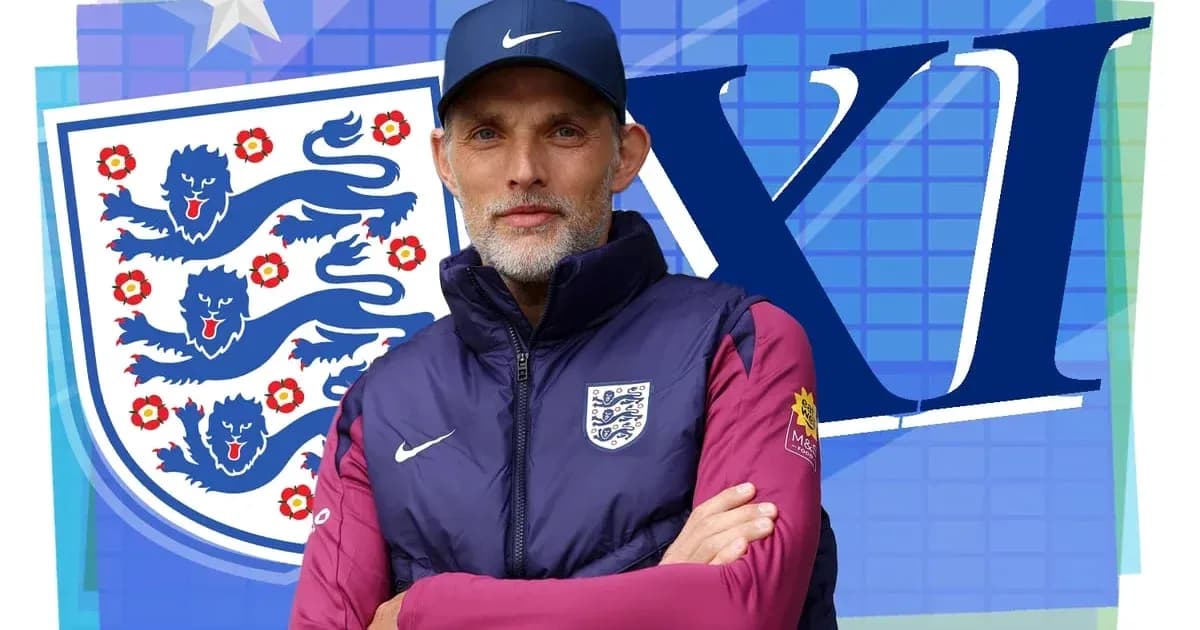 Entrenador posando frente al escudo de Inglaterra