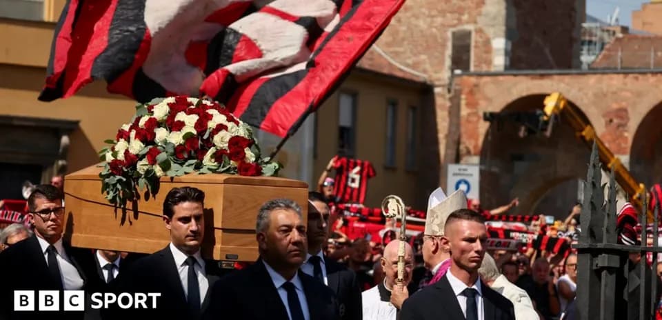Funeral procession with coffin and mourners present