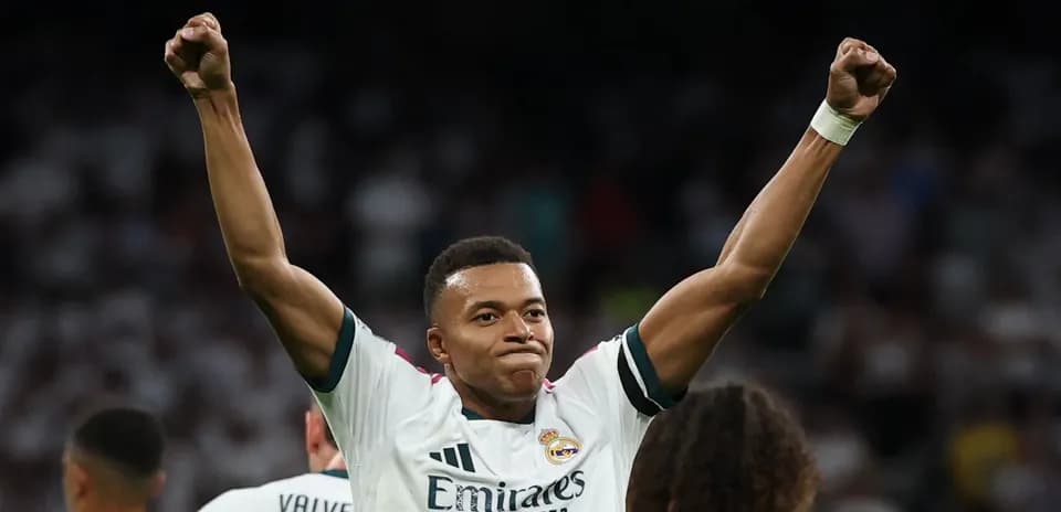 Jugador levantando los brazos en celebración