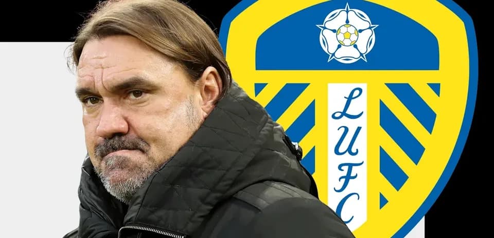 Entrenador frente al escudo de Leeds United