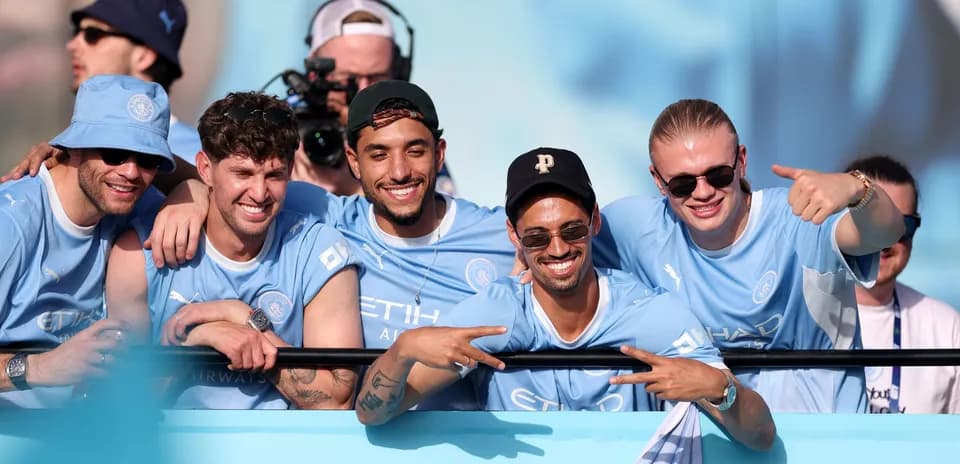 Grupo de aficionados de Manchester City en el estadio