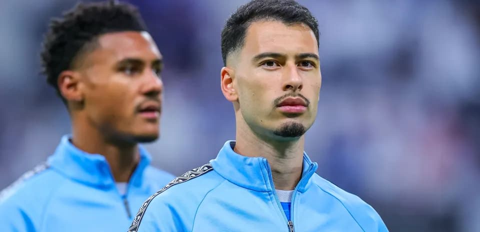 Jugadores del equipo en el calentamiento previo al partido