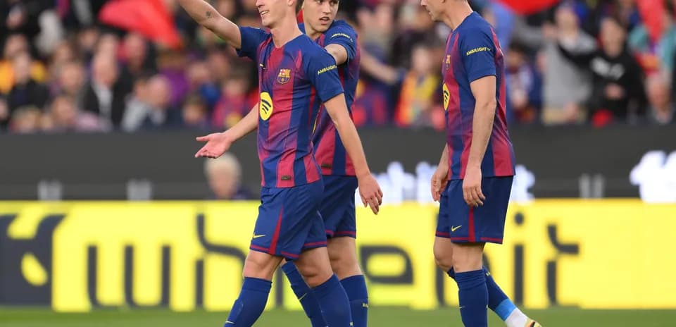 Jugadores del Barcelona celebrando en el campo