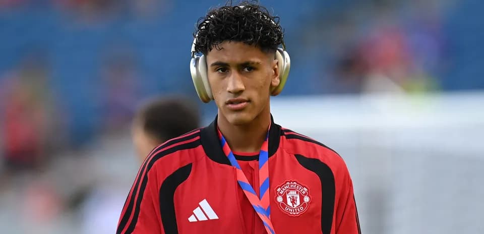 Jugador de Manchester United con auriculares antes del partido