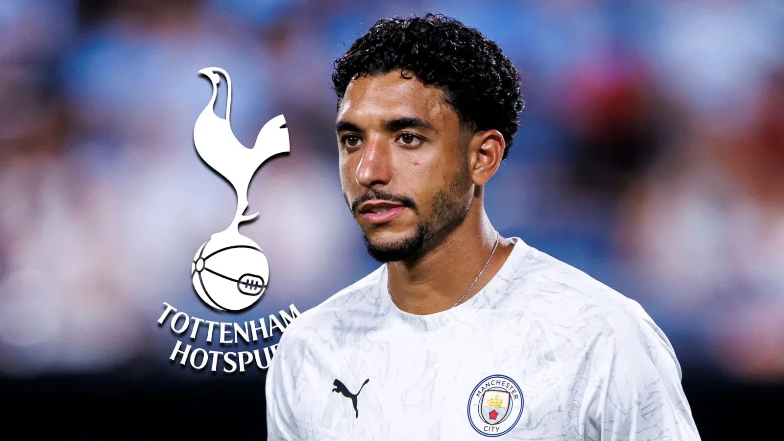 Jugador de fútbol en camiseta de Manchester City