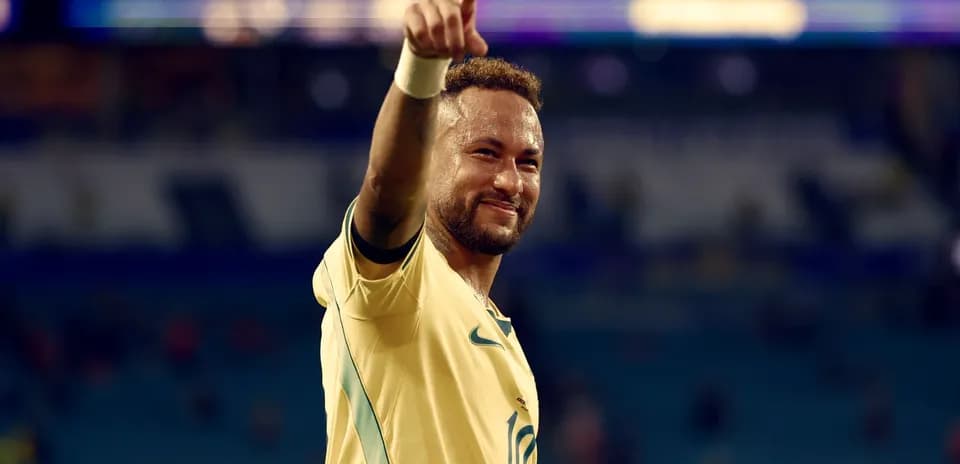 Jugador brasileño celebrando con el pulgar hacia arriba