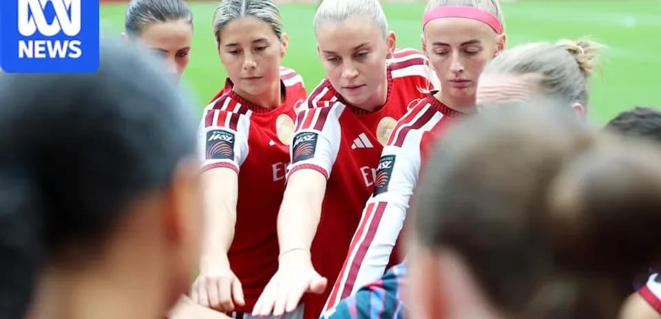 Jugadoras de fútbol en reunión antes del partido