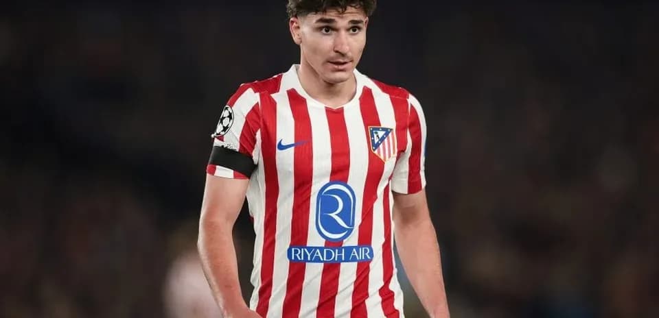 Jugador de Atlético de Madrid en acción durante el partido