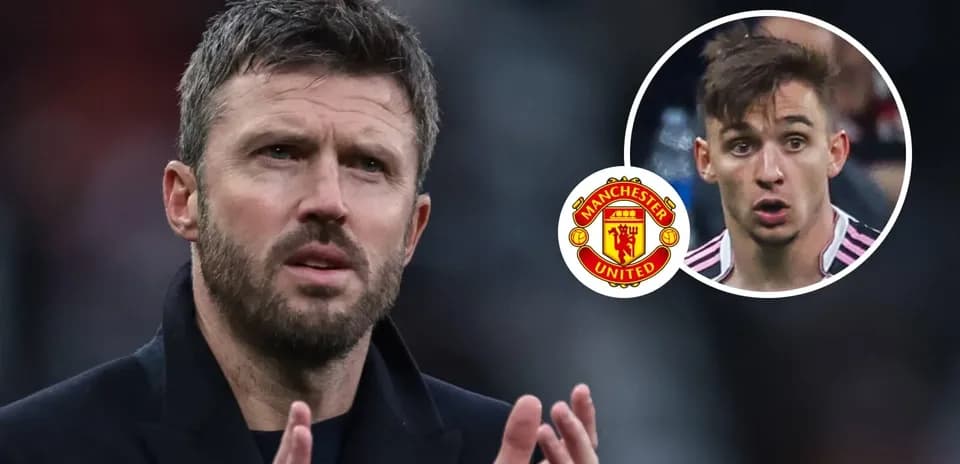 Michael Carrick gesturing during match with Manchester United logo