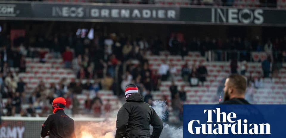Aflare being lit by fans in stadium stands