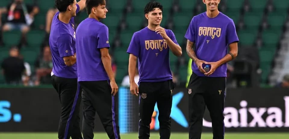 Jugadores en calentamiento antes del partido