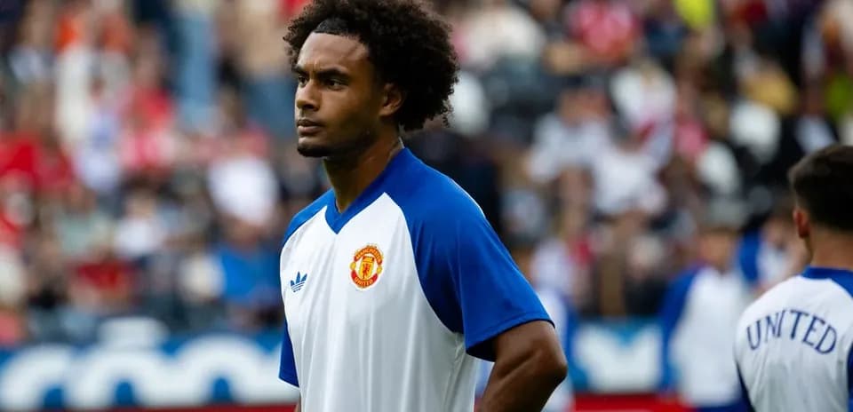 Jugador de Manchester United en calentamiento antes del partido