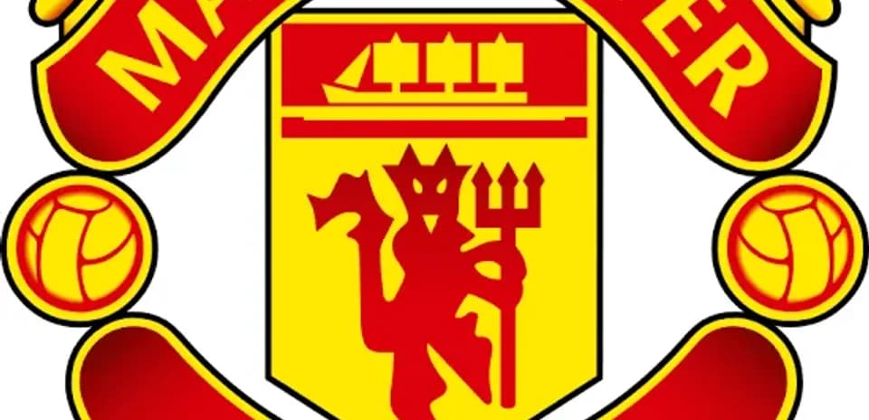 Escudo del Manchester United en colores rojo y amarillo