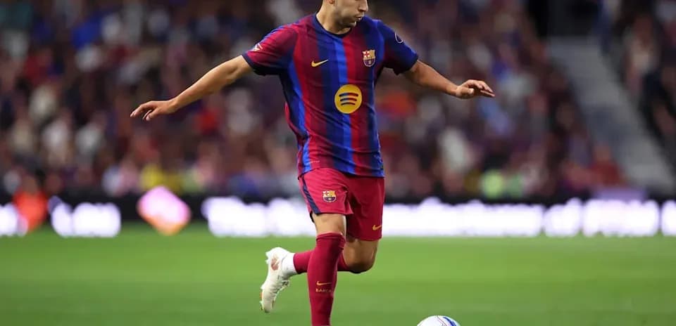 Jugador de Barcelona preparando un tiro con el balón
