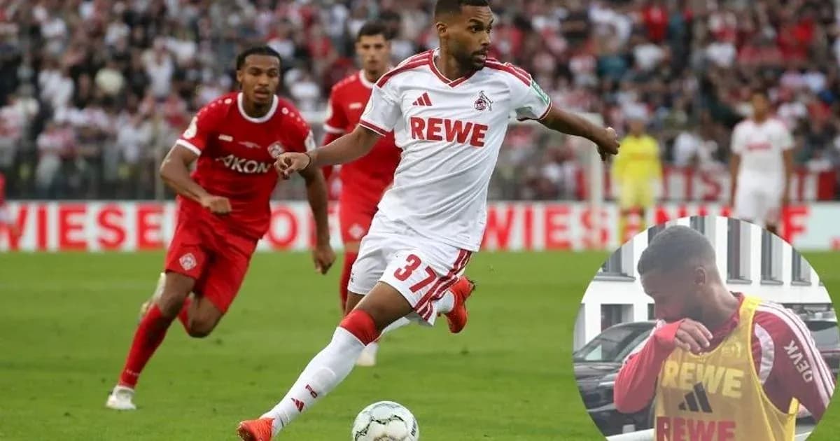 Jugador del FC Köln corriendo con el balón durante el partido Jugador del FC Köln corriendo con el balón durante el partido