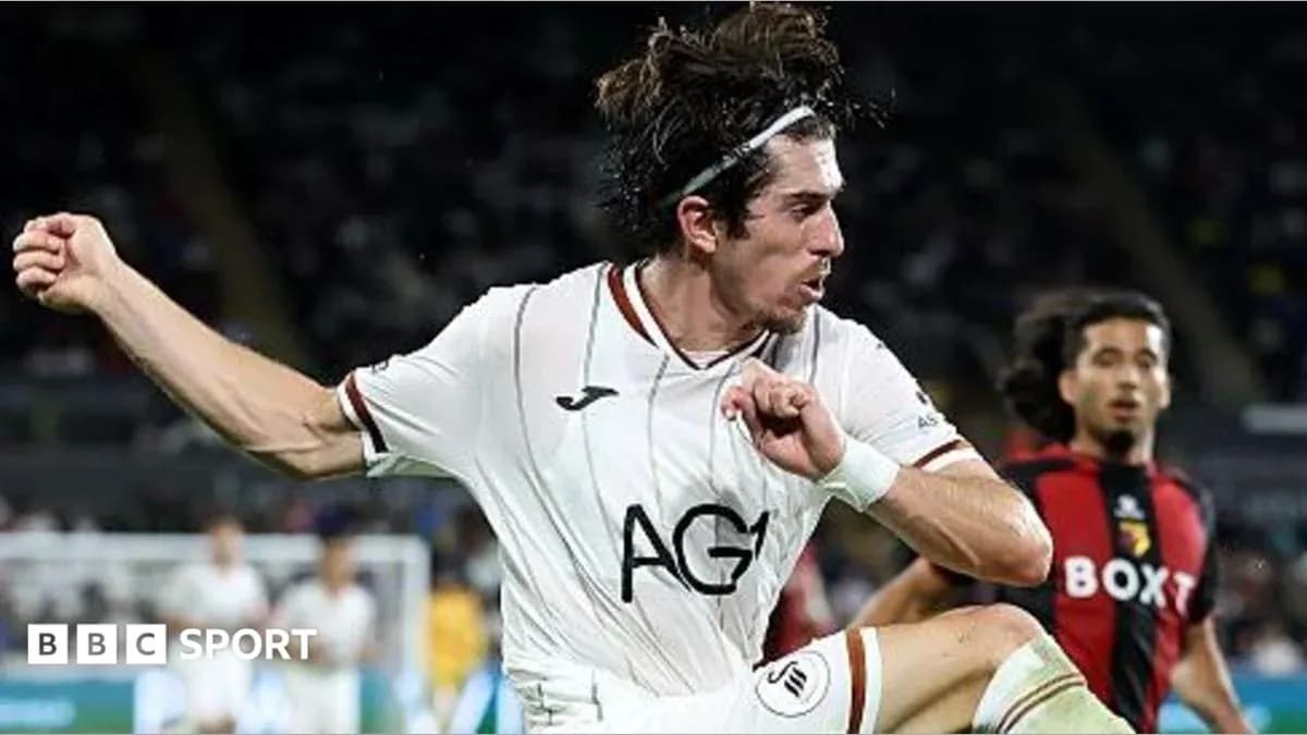 Jugador de fútbol en acción durante un partido Jugador de fútbol en acción durante un partido