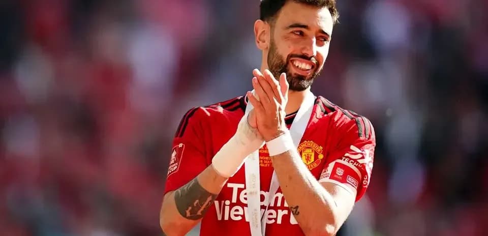 Jugador aplaudiendo con medalla en el cuello Jugador aplaudiendo con medalla en el cuello